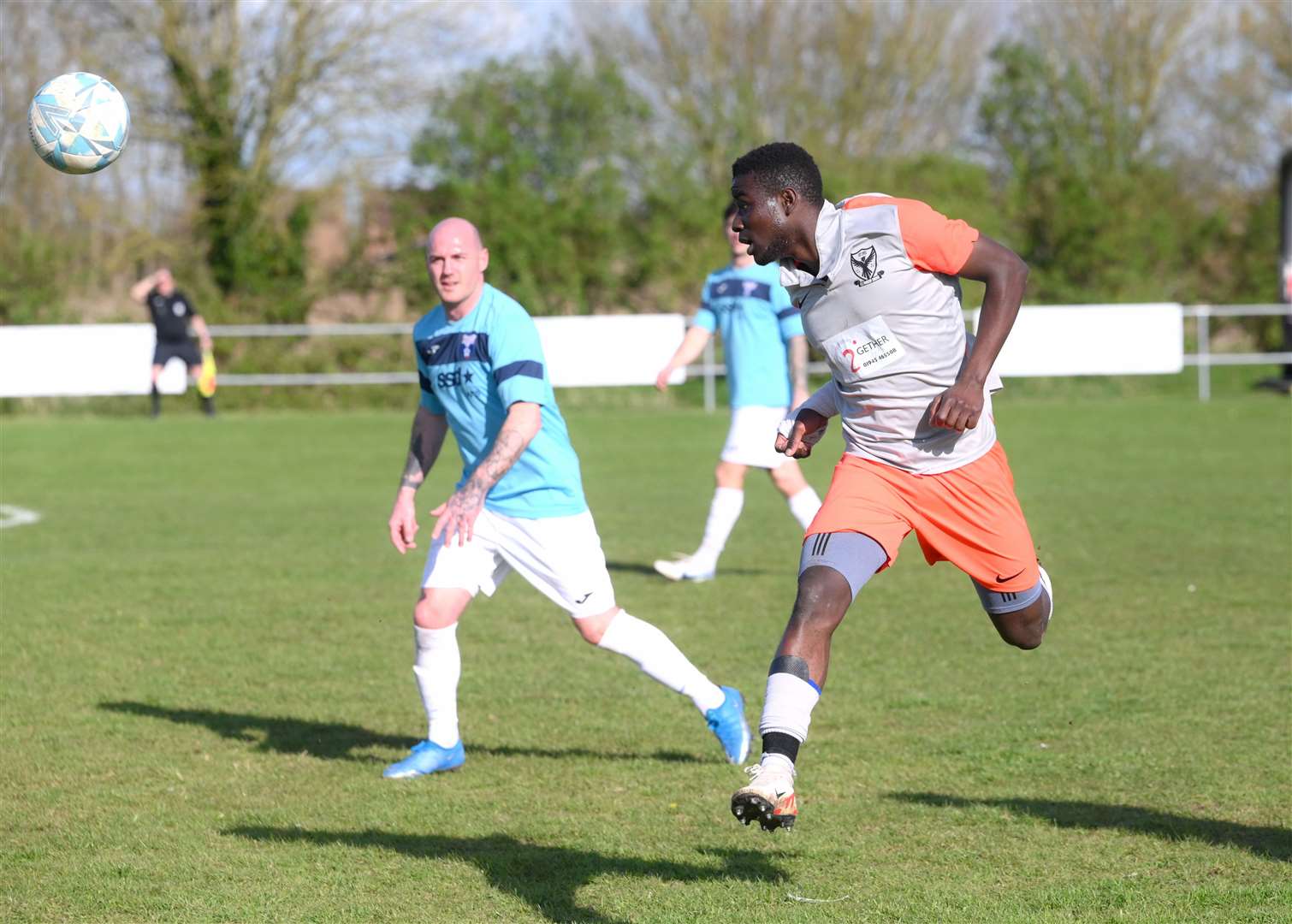 Parson Drove (grey and orange) v Holland (blue). Byron Adiado