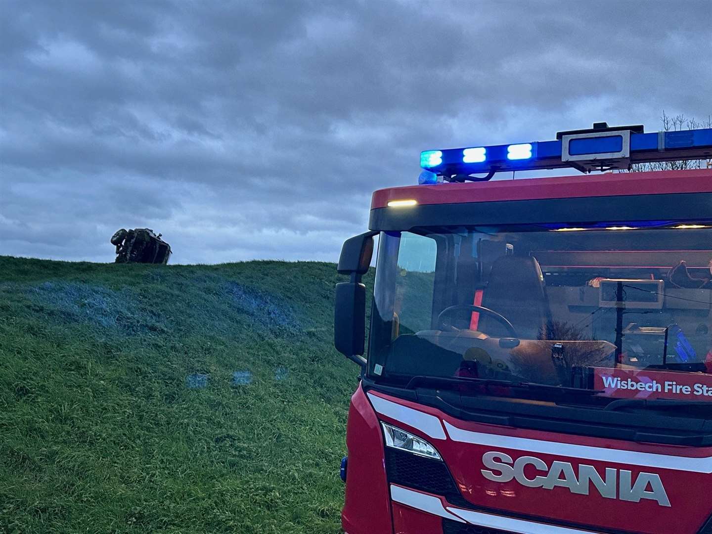 Fire, ambulance and police all attended the incident in Guyhirn which saw two people taken for hospital checks.