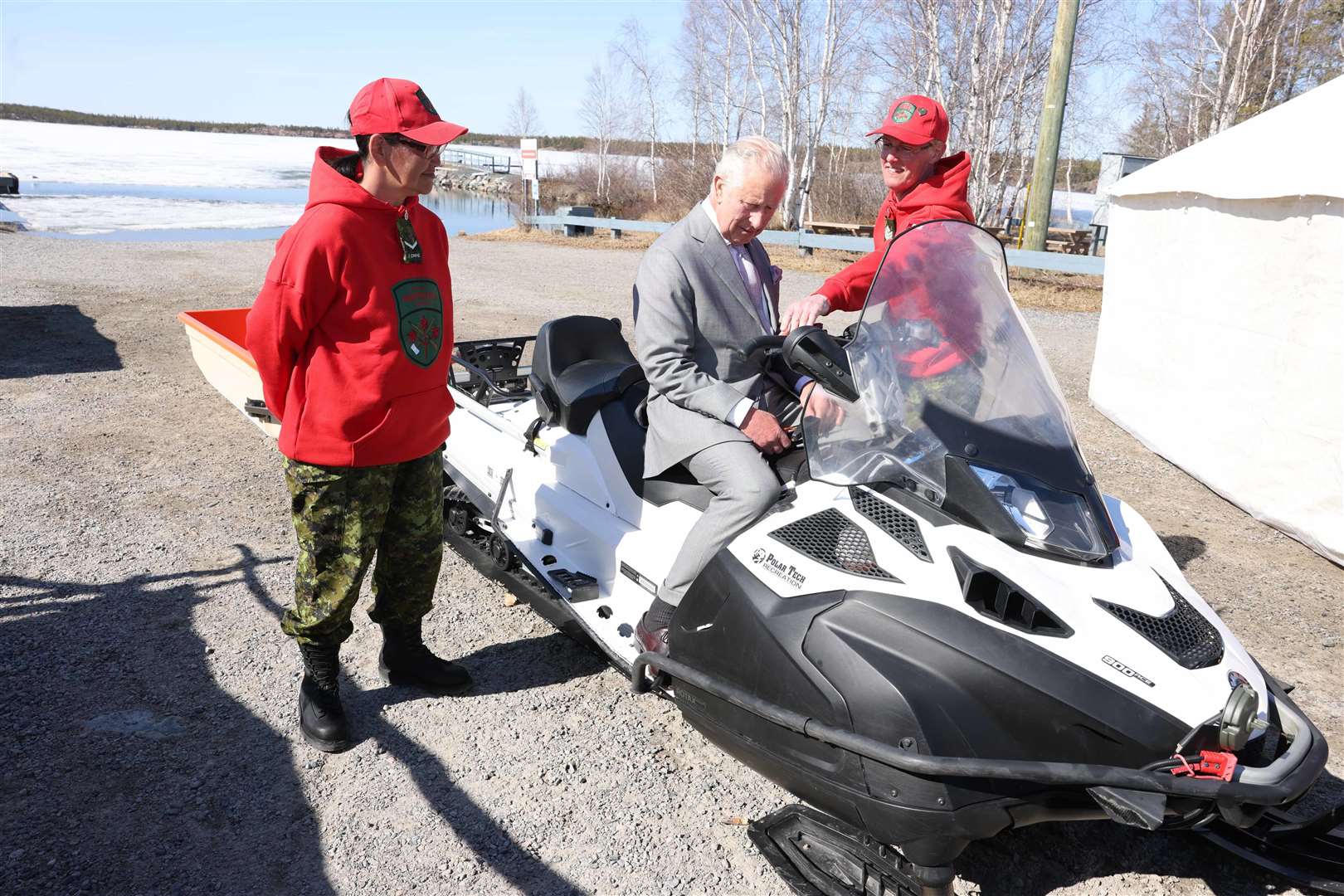 Charles sits on a snow mobile used by Canadian Rangers during a 2022 visit to Fred Henne Territorial Park, Yellowknife in Canada (Ian Vogler/Daily Mirror)