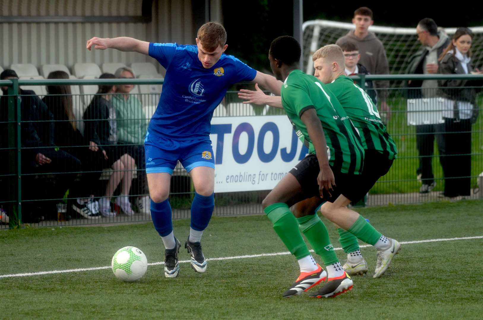 March (Blue) v Blackstones (Green and Black) in the final of the Hinchingbrooke Cup
