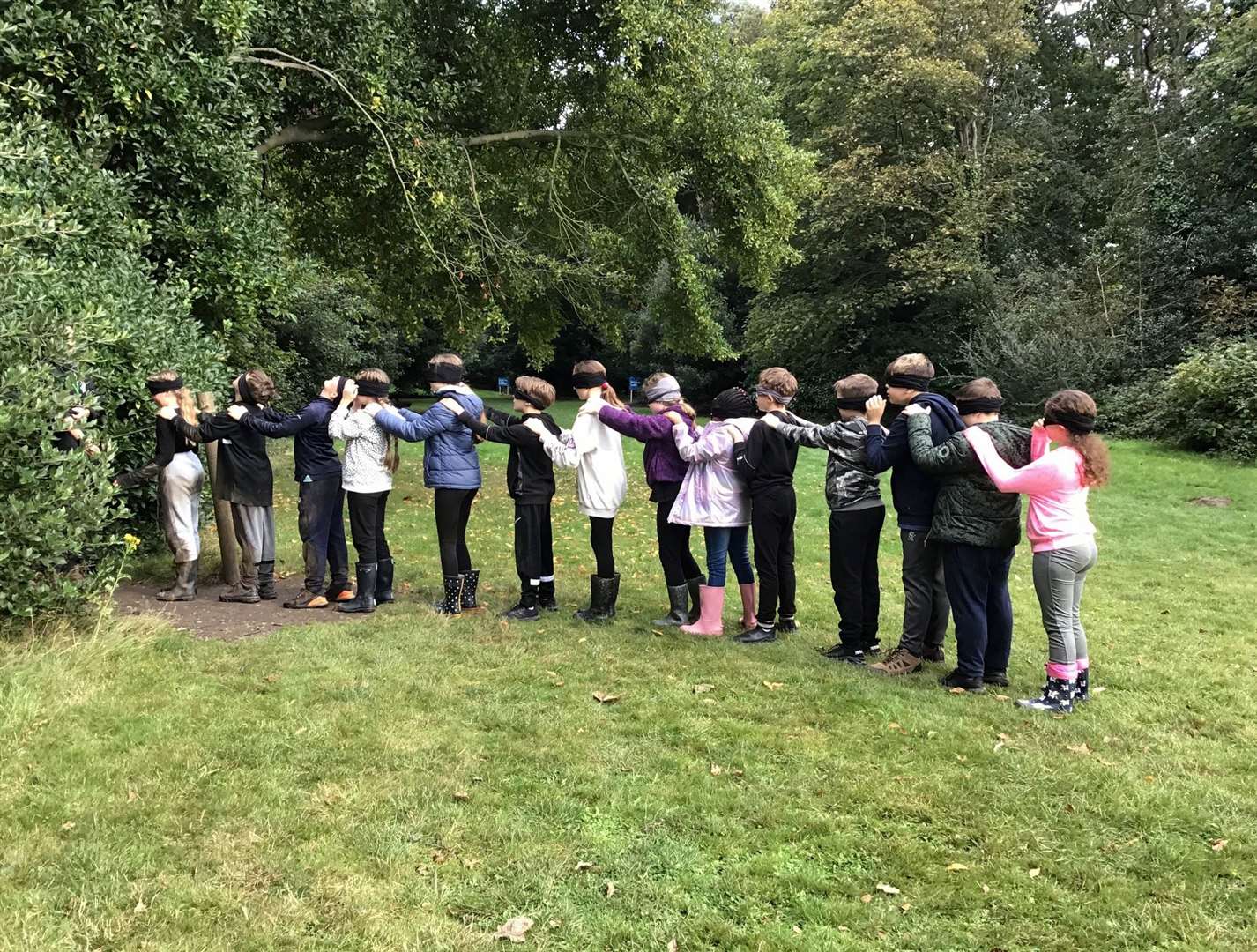 Children tried a variety of activities including wearing a blindfold.