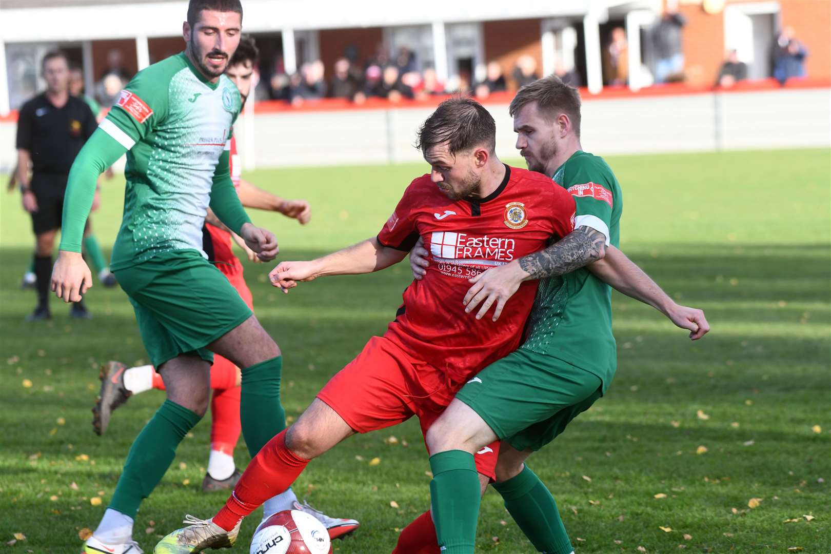 Eoin McQuaid battles for possession.