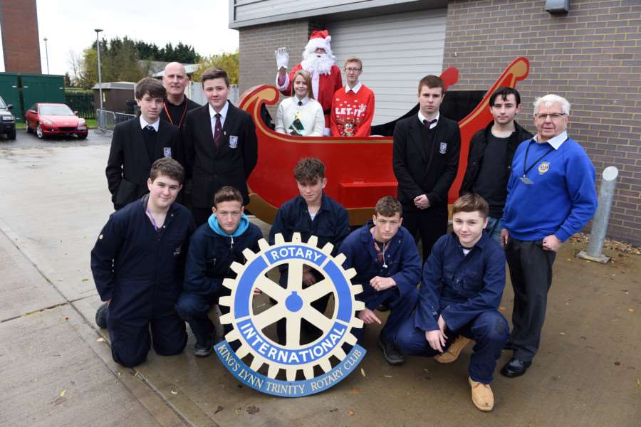 College of West Anglia construction students handing over Santa's Sleigh they designed and built for Kings Lynn Rotary Club. ANL-161124-091616009