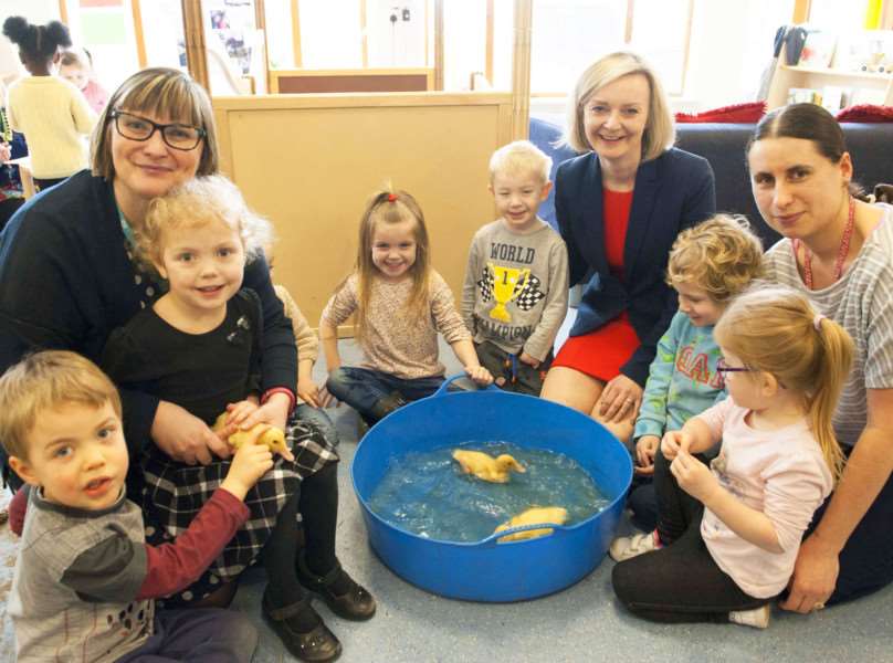 Elizabeth Truss MP visits Emneth Nusery School. Pictured Centre Elizabeth Truss and left Holly Bowman (Head Teacher) with chilcren and staff.