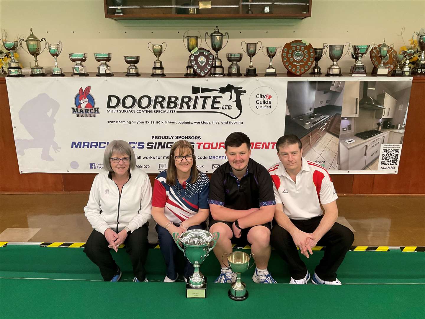 Pictured are March singles finalists Ginnie Marsh, Cheryl Salisbury, Jack Larter and Mark Denny.