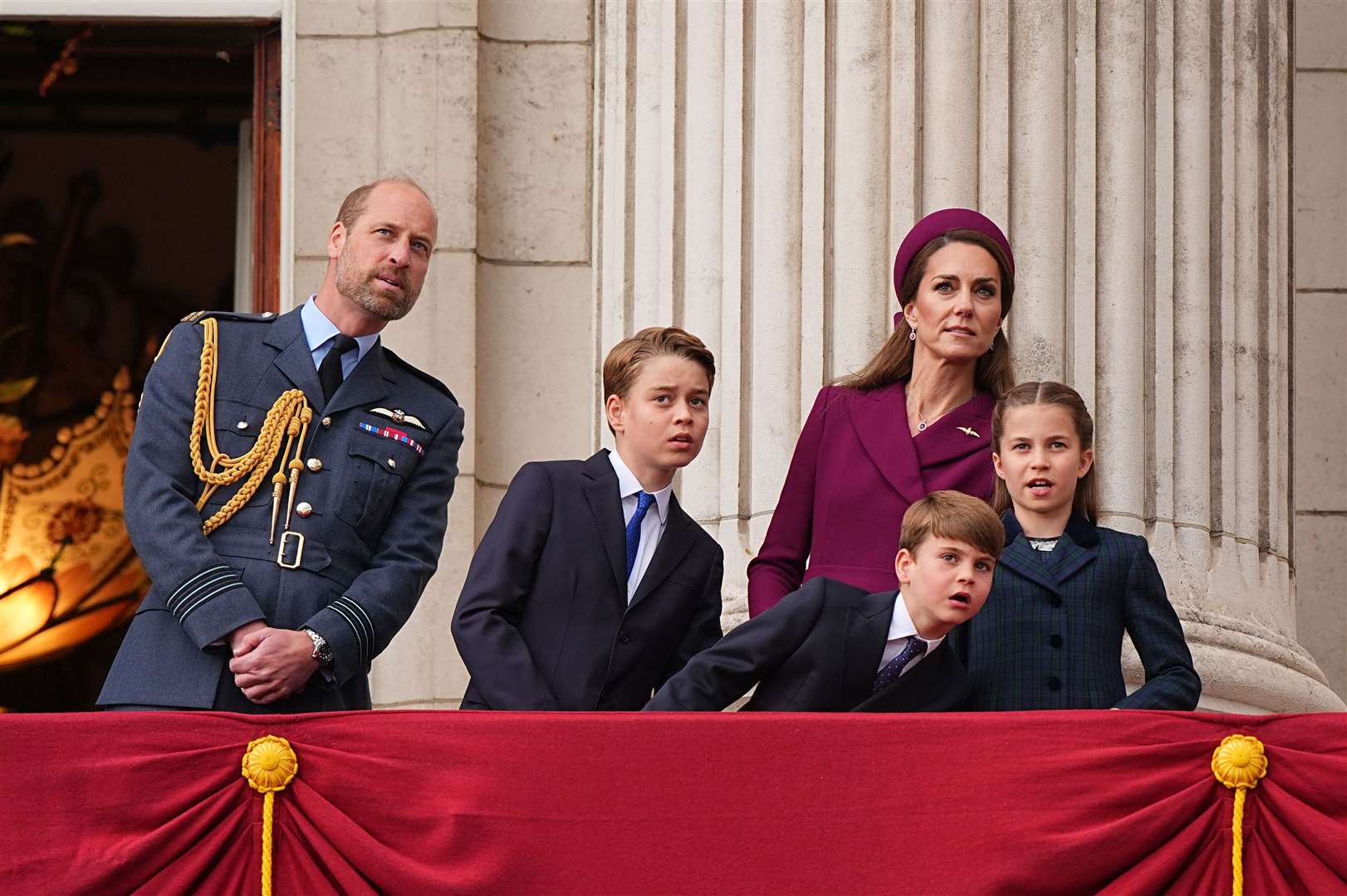 The Prince of Wales, Prince George, Prince Louis, the Princess of Wales and Princess Charlotte watch the fly-past (Aaron Chown/PA)
