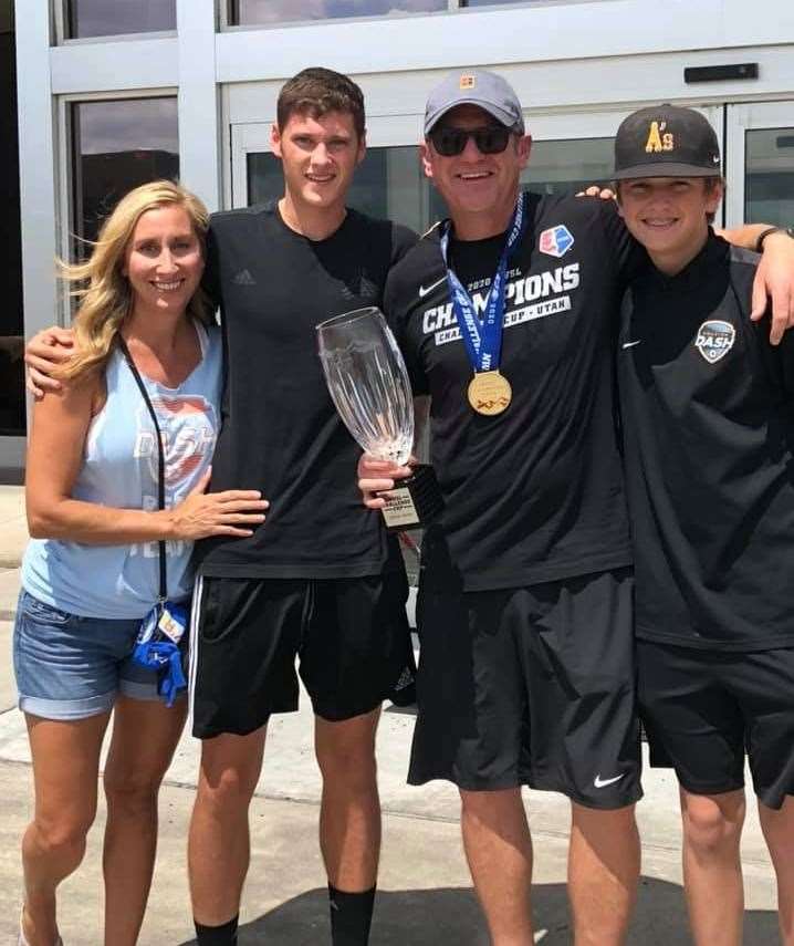 Head coach James Clarkson with his wife and sons after Houston Dash's success in the NWSL Challenge Cup in Utah, USA. Photo supplied.