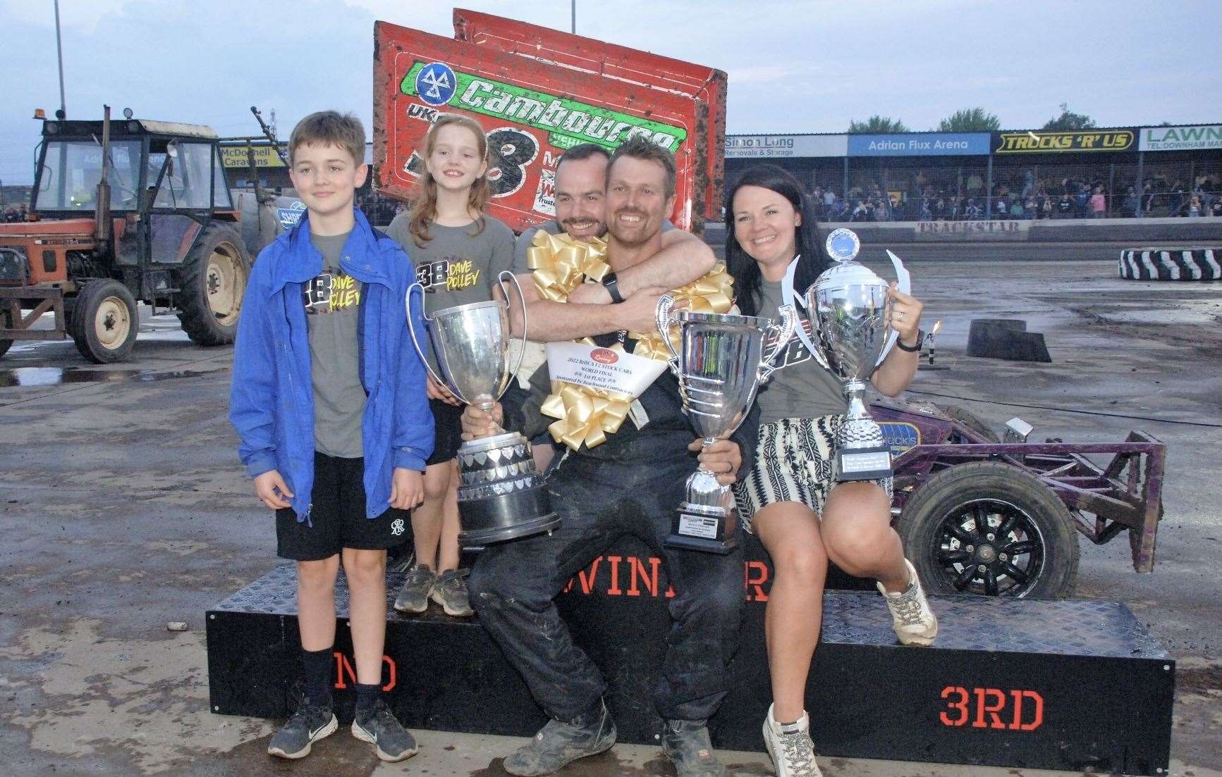 Dave Polley celebrates his BriSCA F2 Stock Car World Final win with family (Picture: Colin Casserley)