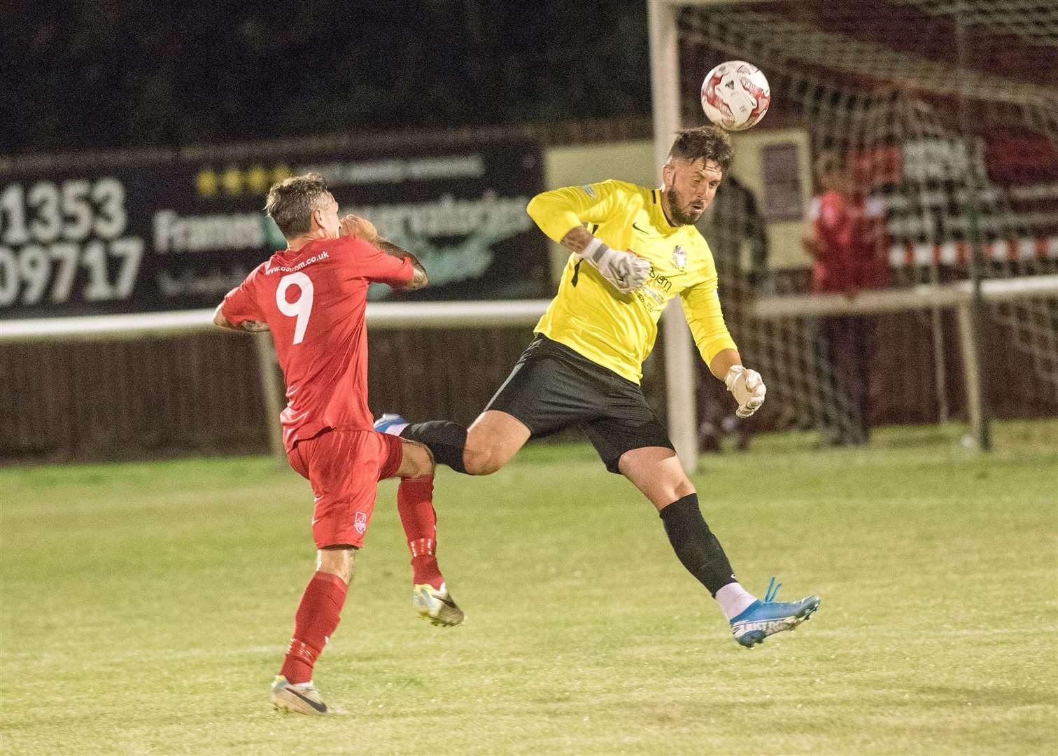 FA Cup replay Ely City V Wisbech Town Sam Reed Ely tackled by Wisbech keeper. Picture by Mark Westley. (16097992)