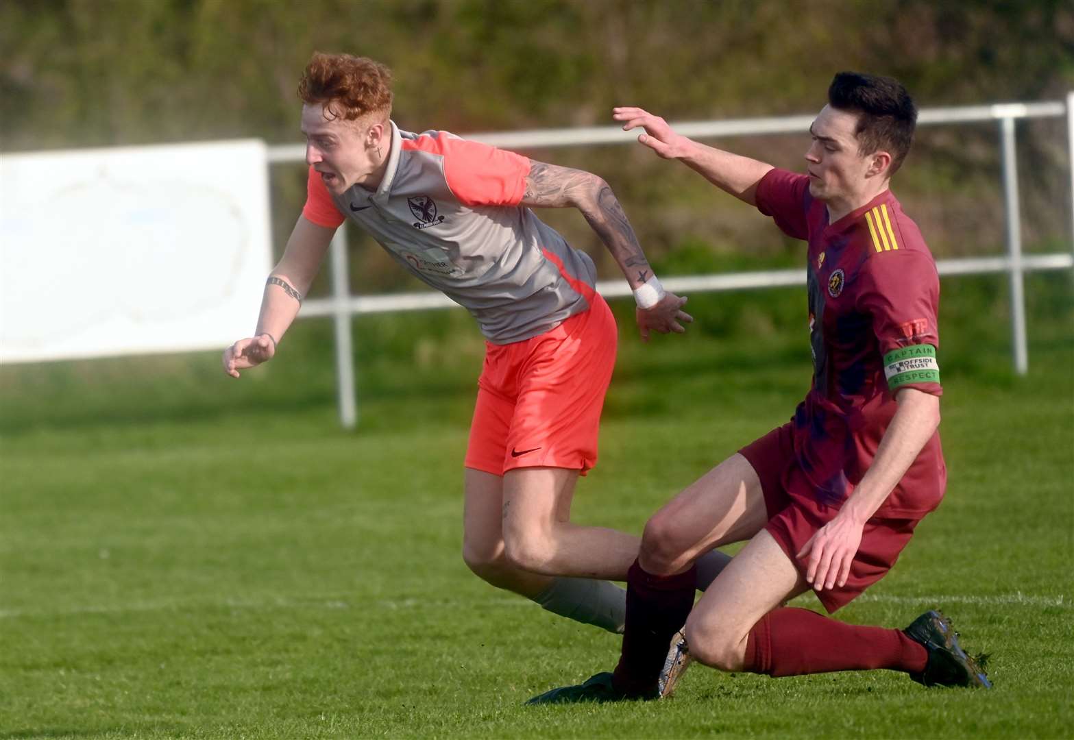 Matteo Perkins being fouled for a penalty for Parson Drove