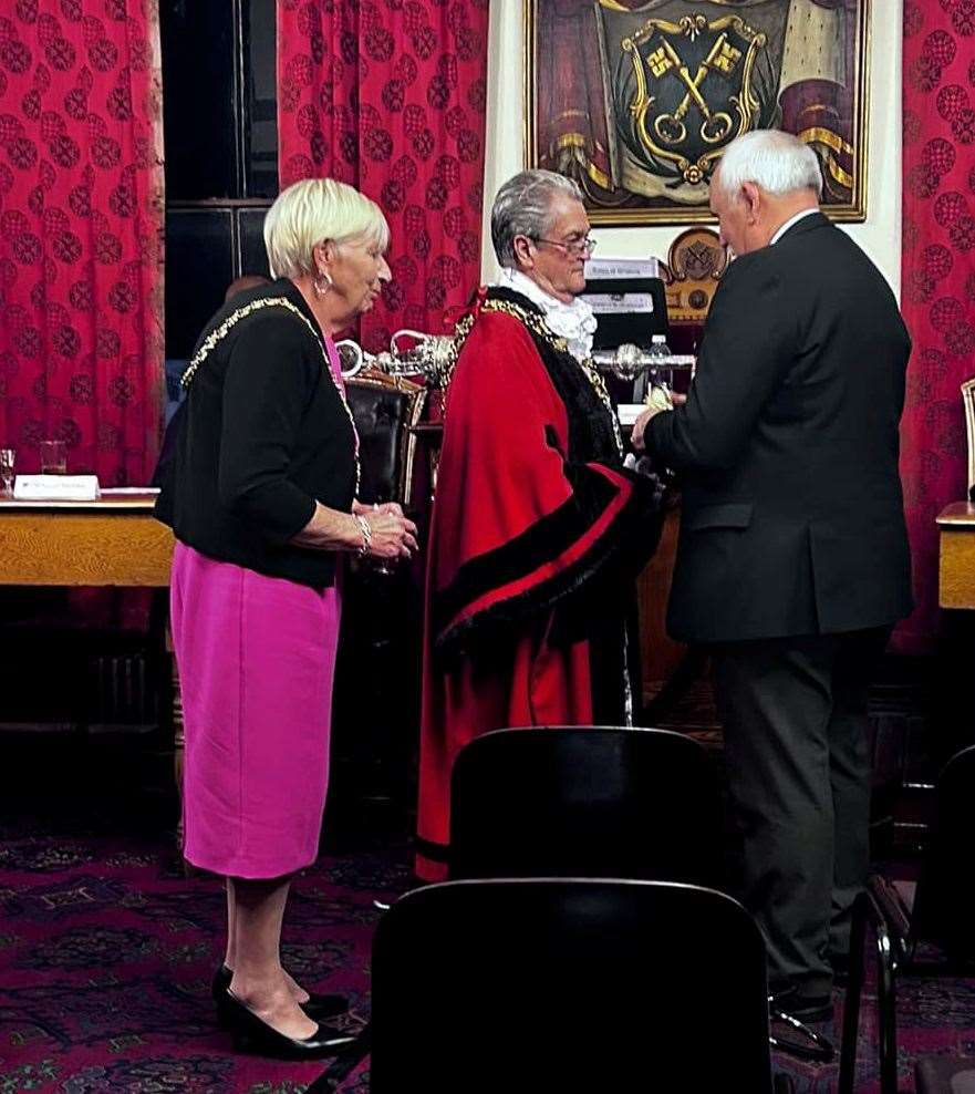 Mayor Peter Human presents the Freedom of the Town to Toby North on behalf of the town's Royal British Legion.