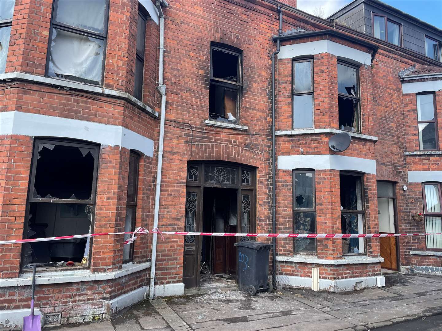 Damaged property at Clonavon Terrace, Ballymena (Jonathan McCambridge/PA)