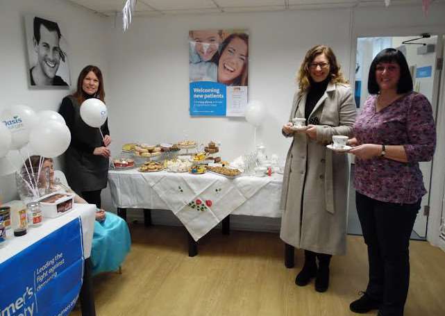 Staff and customers at the Oasis practice
