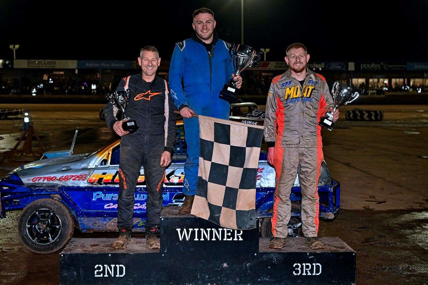 The top three in the 1300 stock car World of Shale Championship which was won by Jacob Bromley, centre, from the Fe3nland father and son duo of John, left, and Dean Moat, right. Picture: Jim Harrod