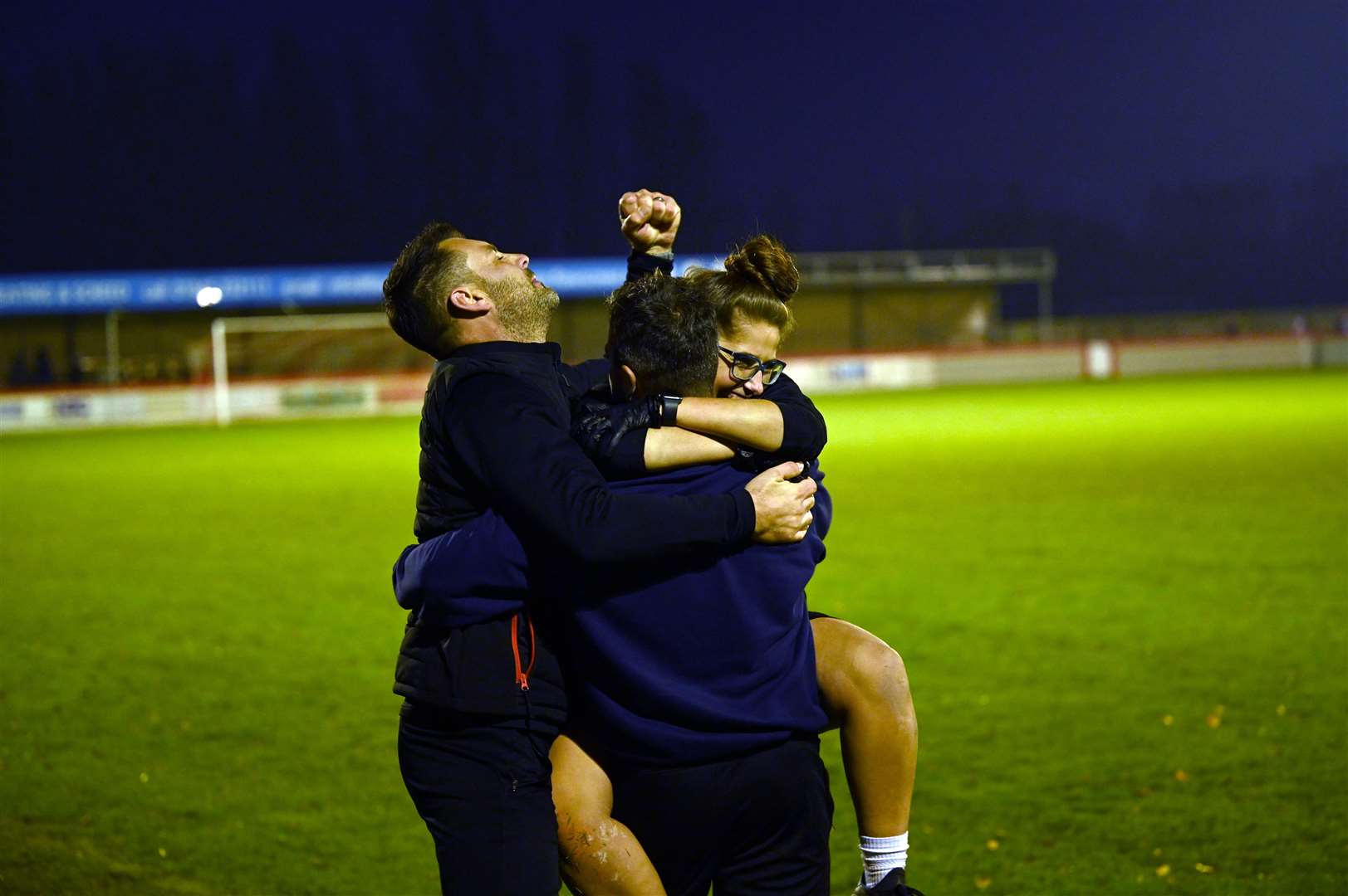 Elation at the final whistle for assistant manager Danny Brooks, physio Albany Hodgson and manager Leon Mettam