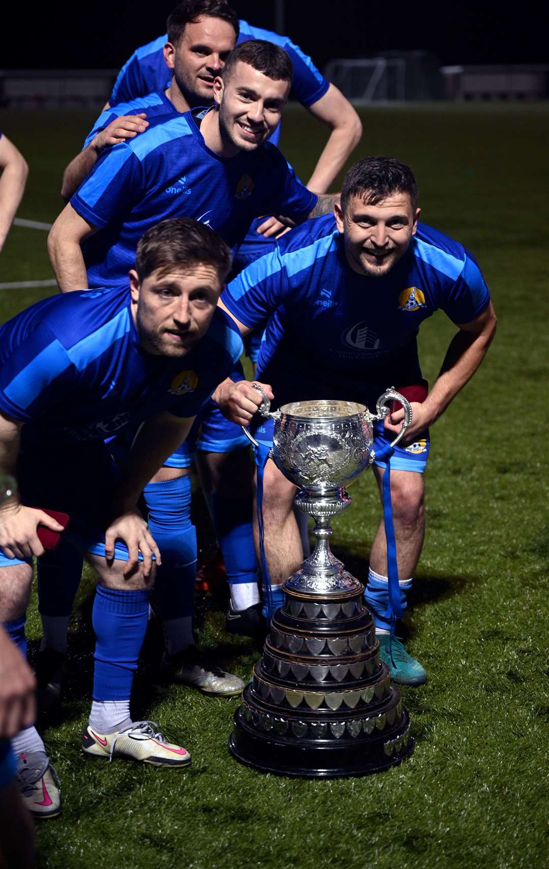 March (Blue) v Blackstones (Green and Black) in the final of the Hinchingbrooke Cup. March celebrate winning the cup