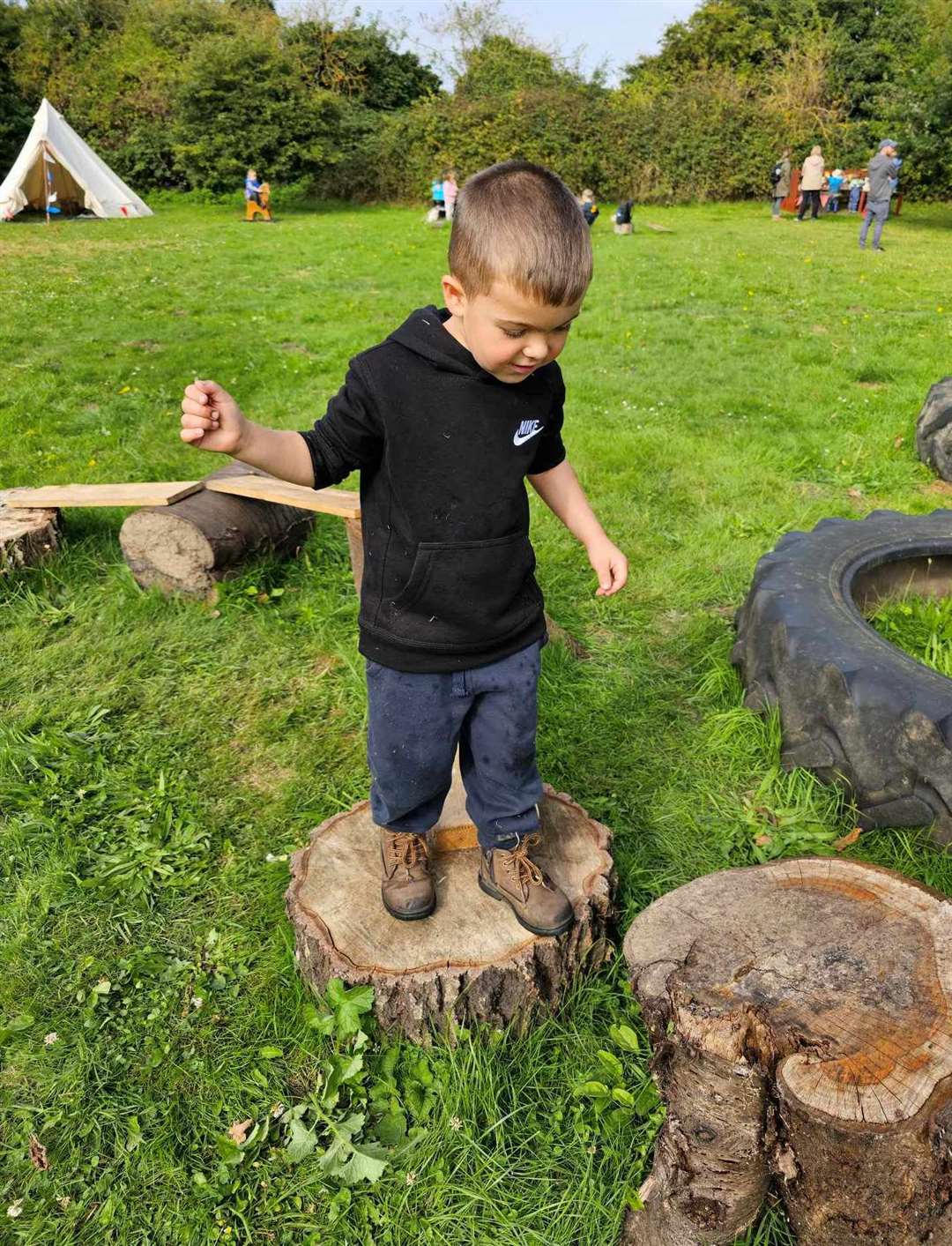 A youngster has fun at the Merry Meadow forest school in Lutton Garnsgate