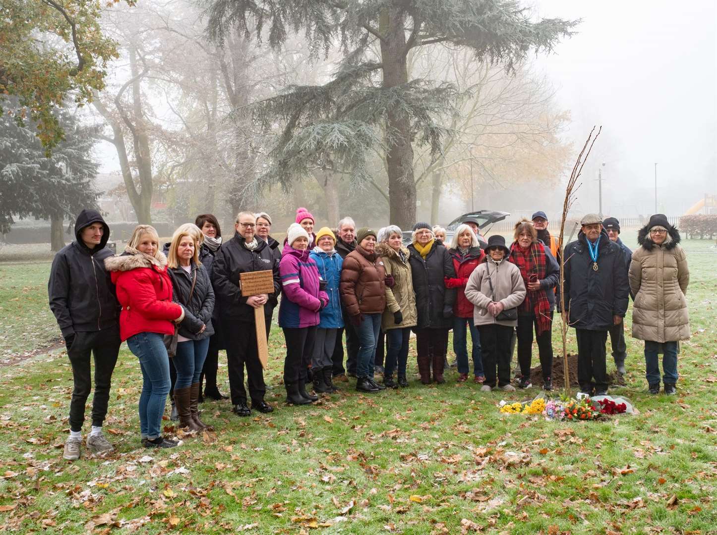 Families of victims and members of Wisbech in Bloom gather for the tree planting. Photo: Roger Rawson.