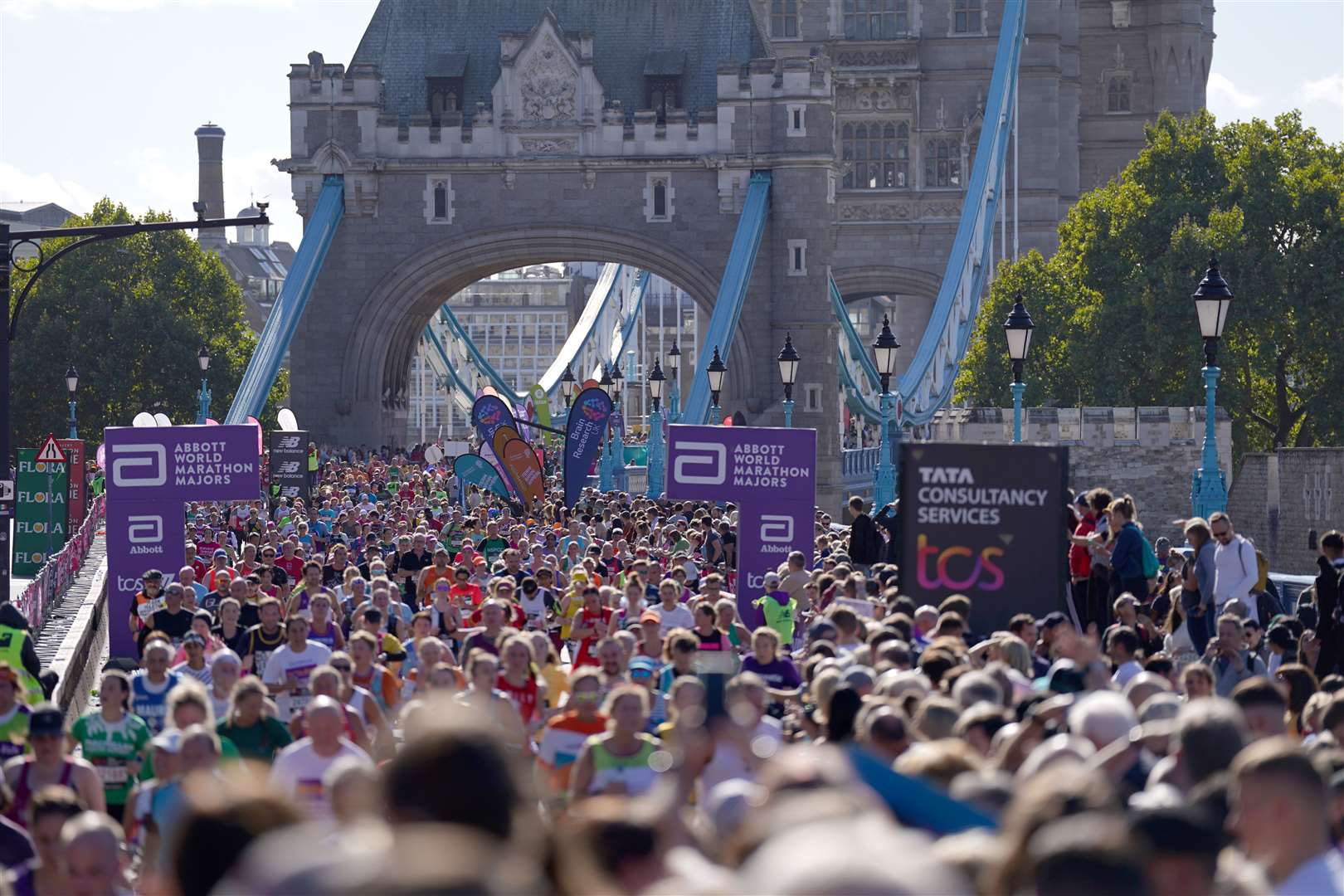Competitors make their way over Tower Bridge (Kirsty O’Connor/PA)