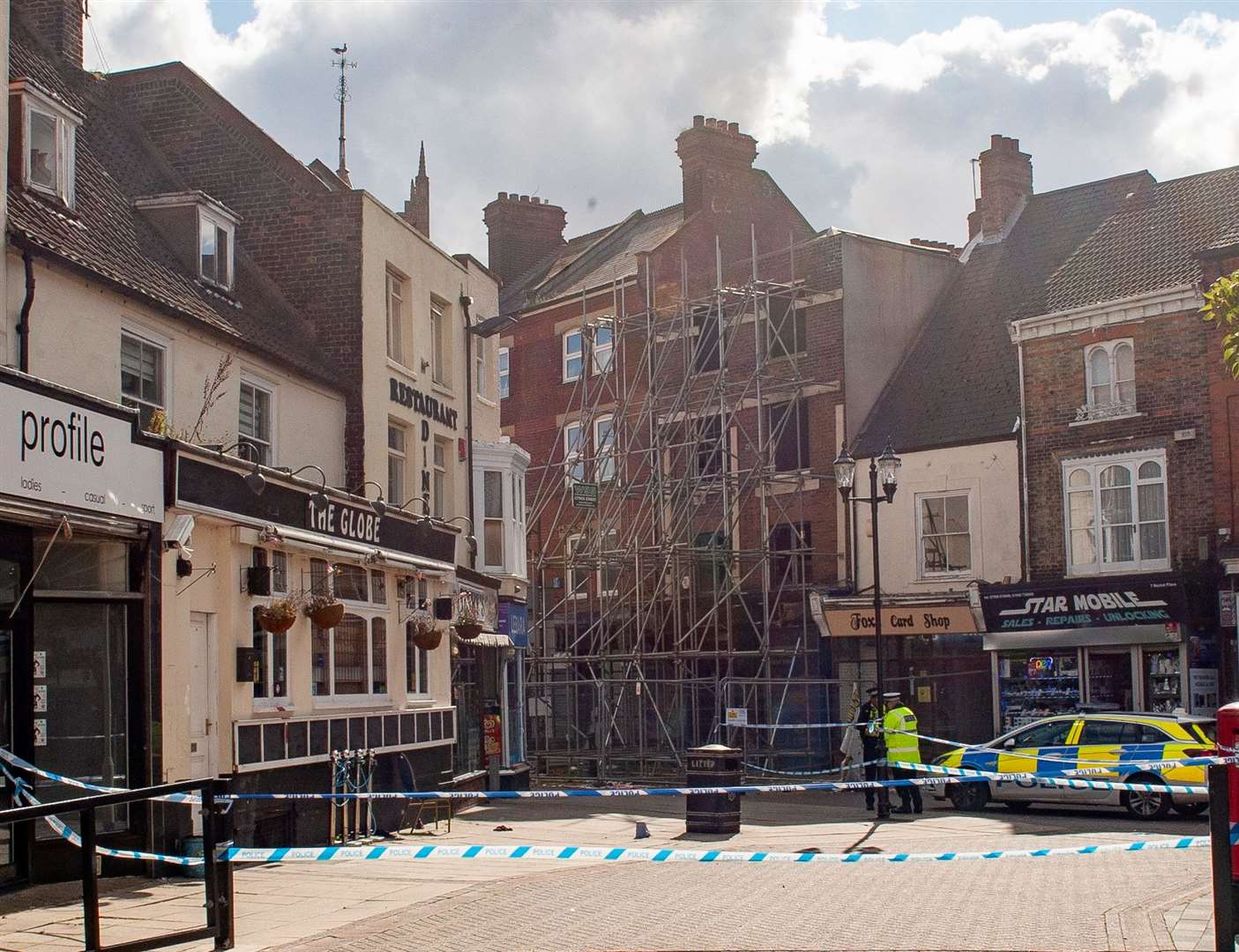 The area around The Globe in Wisbech's Market Place has been taped off today. Pictures: Michael Fysh