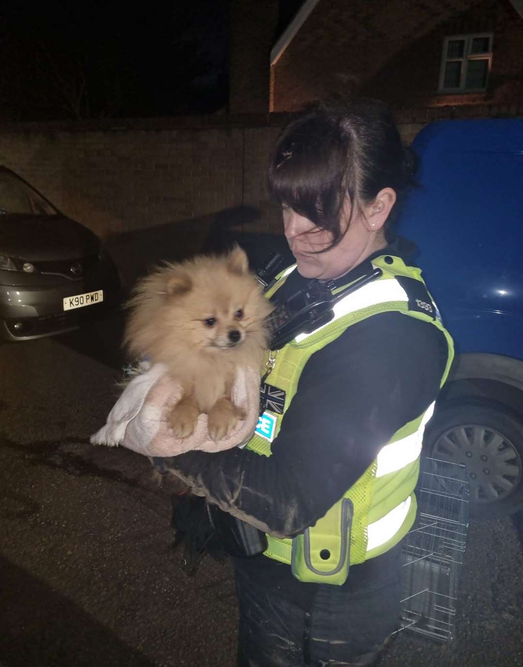 PC Kirsty Hulley with one of the rescued dogs. Picture: Cambridgeshire police