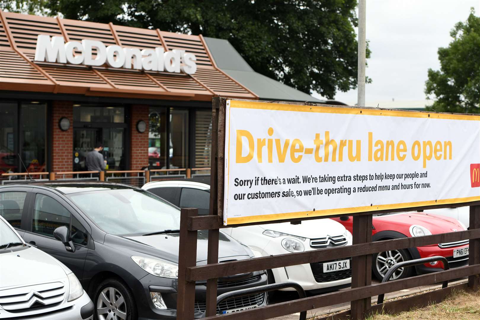 Delight as McDonald's lifts the shutters in Wisbech with a queue of up to 20 cars first thing.