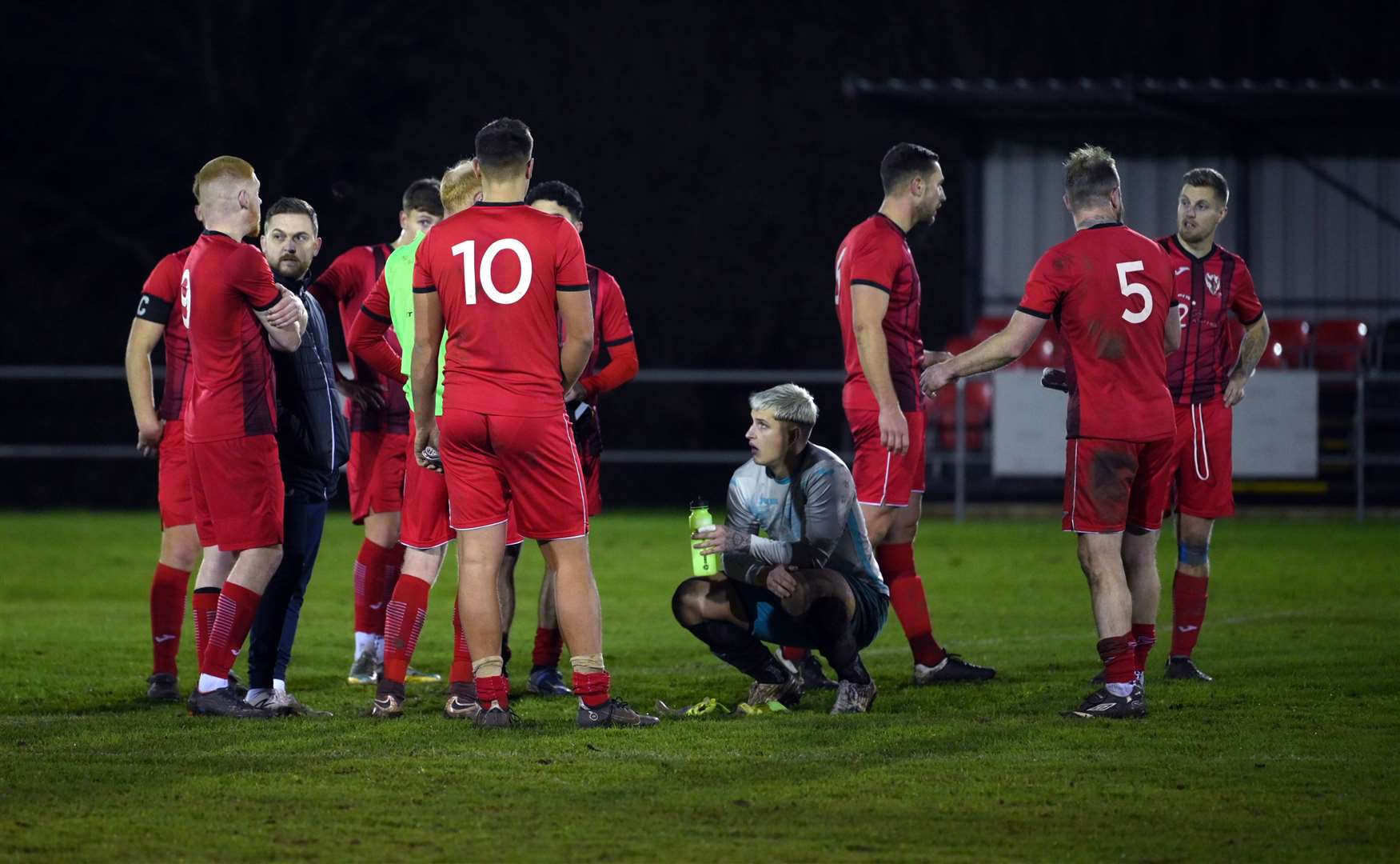 Arran Duke talks to his team after the defeat