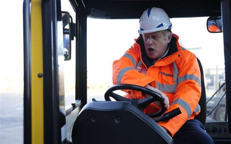 Boris Johnson driving a forklift on a visit to Tilbury Docks (Matt Dunham/PA) (54583200)