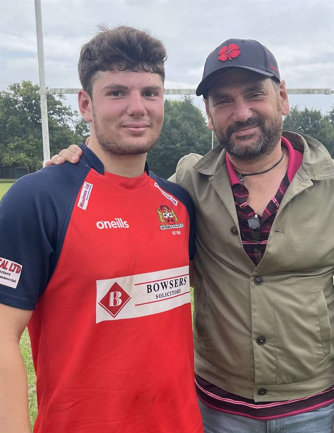 Man of the Match Ari Baghdouyan (22) with proud father Serge