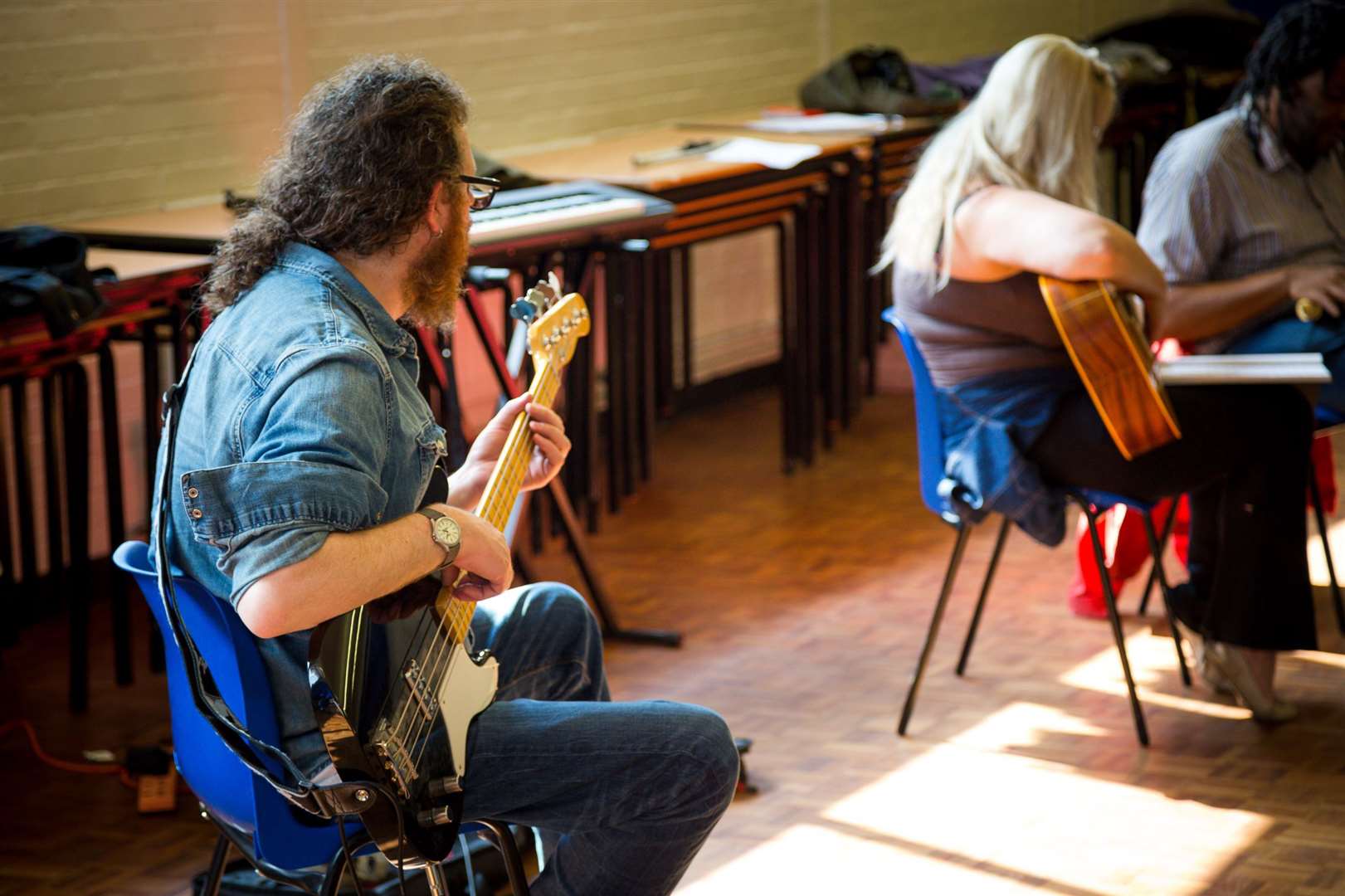 Guitar lessons are just one of a nubmer of free arts courses on offer to adults. (24743095)