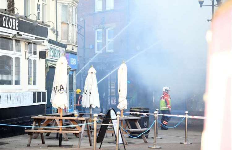A total of eight crews plus an aerial appliance were called to deal with the fire which broke out on the evening of April 22 2022 and saw flames shooting from the shop front and left the building gutted as shown in this image by photographer Adam Fairbrother.
