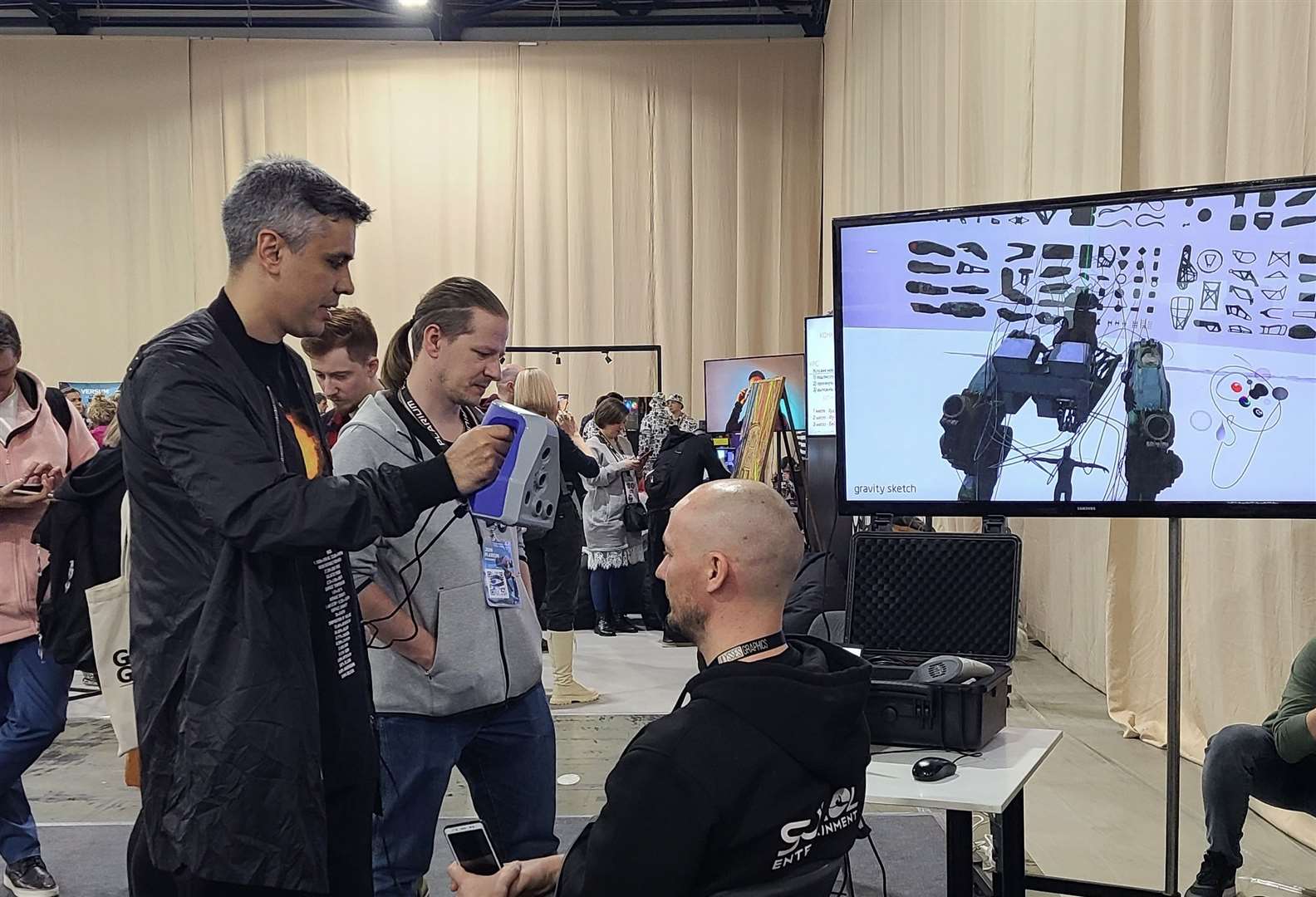 Jama Jurabaev and Andrey Kozyrenko together at a game conference in Ukraine in 2021 (Jama Jurabaev /PA)