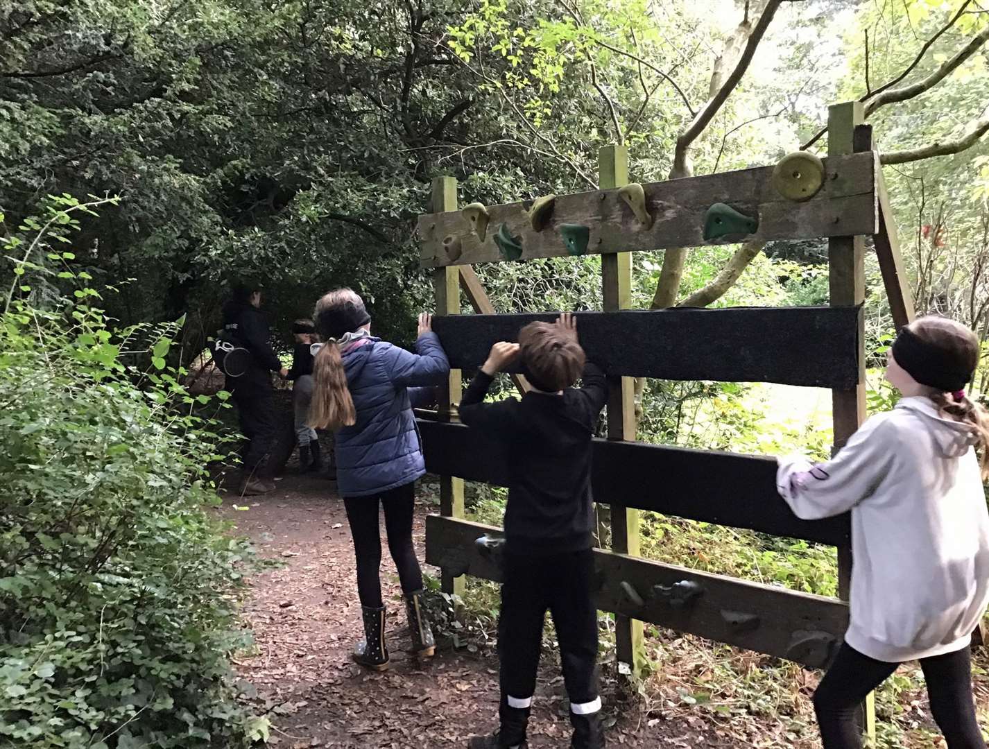 Children tried a variety of activities including wearing a blindfold.