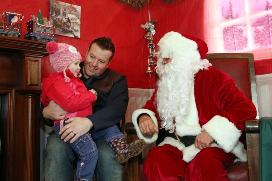 Jamie Bartlett and daughter Isabella, two, meet Santa at Skylark Garden Centre, Wimblington.