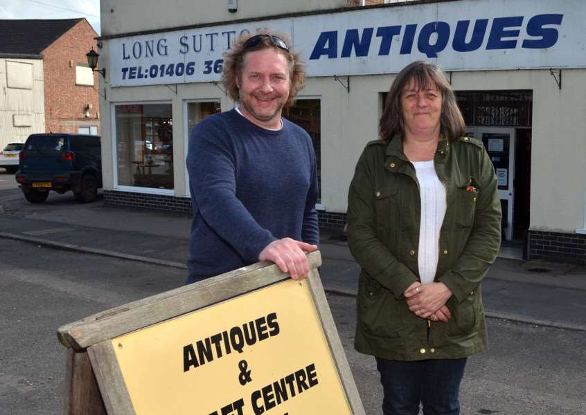 BOX OF SURPRISES: Long Sutton Antique Centre where outside are owner David Whitwell and trader Michelle Manley. Photo by Tim Wilson. SG130517-317TW.
