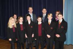 GOOD DEAL: Some of the Neale Wade Year Seven students are pictured with Louise Stanley, regional HR manager at Smurfitt Kappa, and regional director Mike Fadden with Neale Wade principal Jason Wing and assistant principal Sam Mandley.