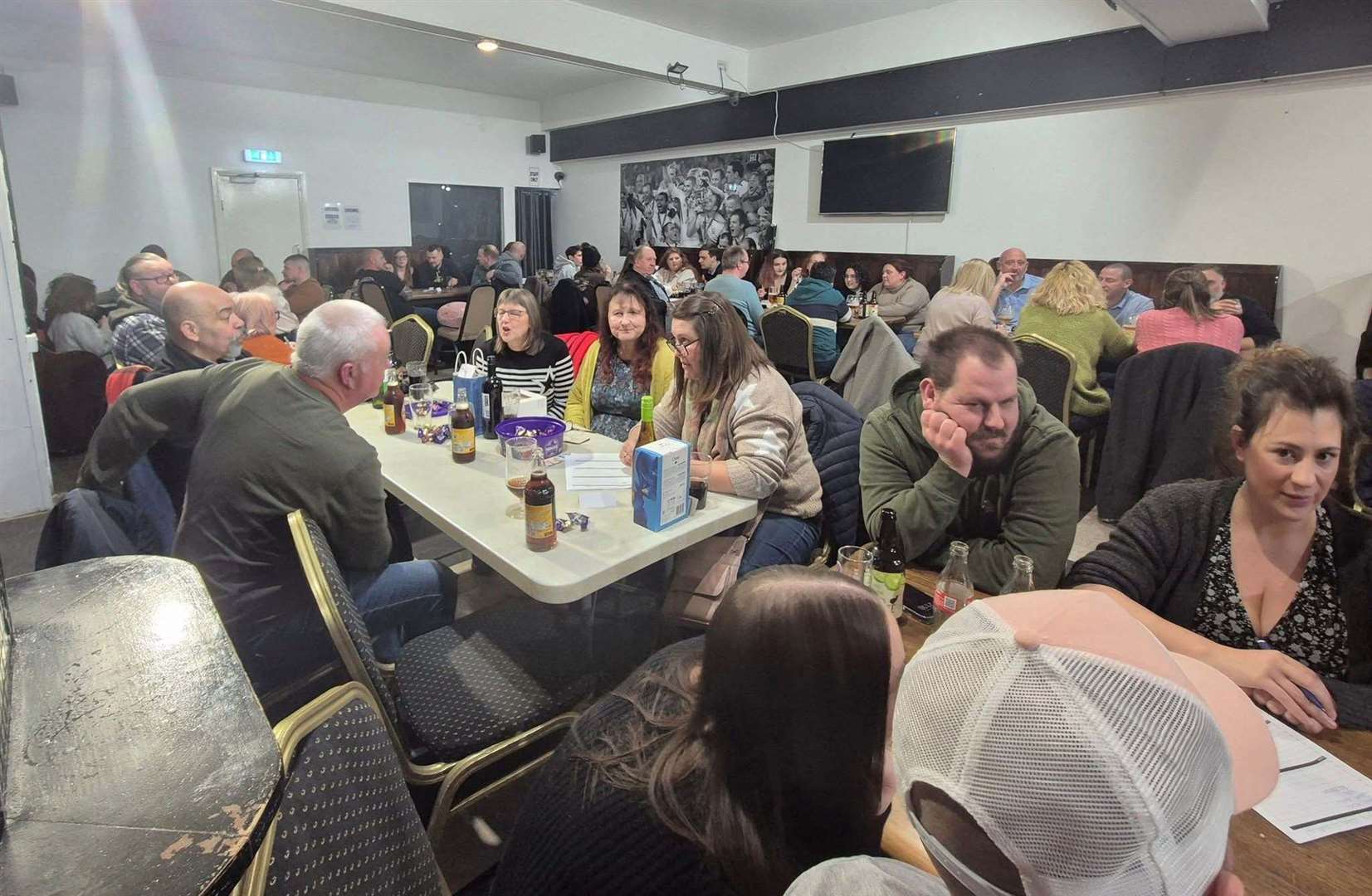 The quiz teams put their thinking caps on to find the answers to quizmaster Tommy's questions