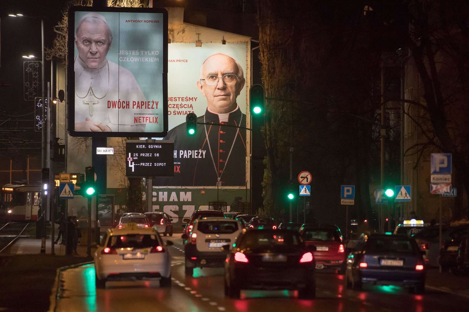 A billboard for The Two Popes (Alamy/PA)