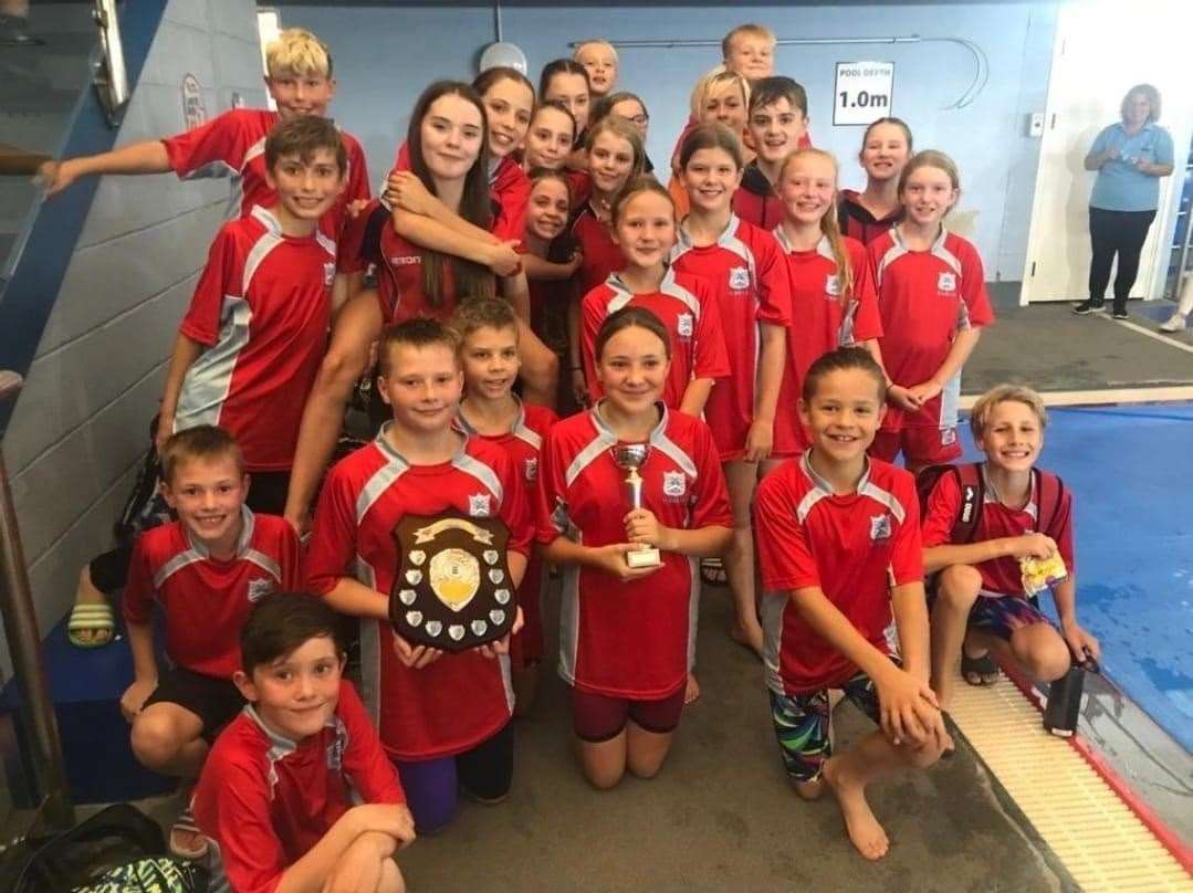 Wisbech were the JFL winners 2023 team, pictured with captains Jake Trundle and Isabella Burton holding the shield