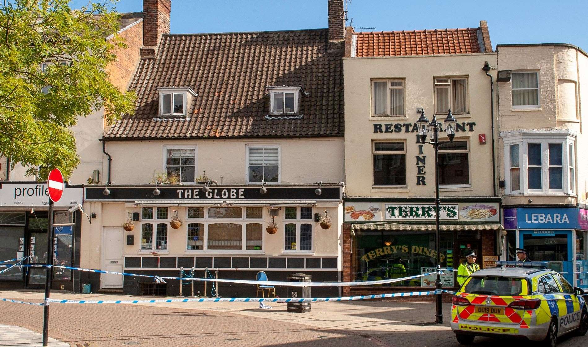 The area around The Globe in Wisbech's Market Place has been taped off today. Pictures: Michael Fysh
