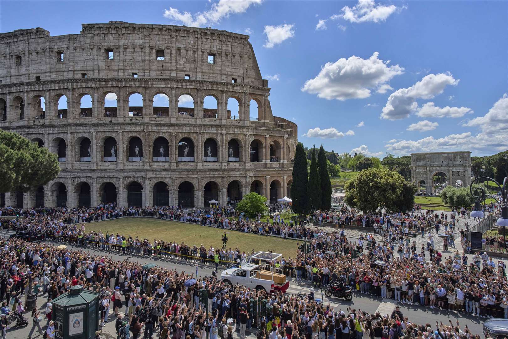 The coffin of Pope Francis passes the Colosseum in Rome en route to St Mary Major Basilica (Bernat Armangue/AP)