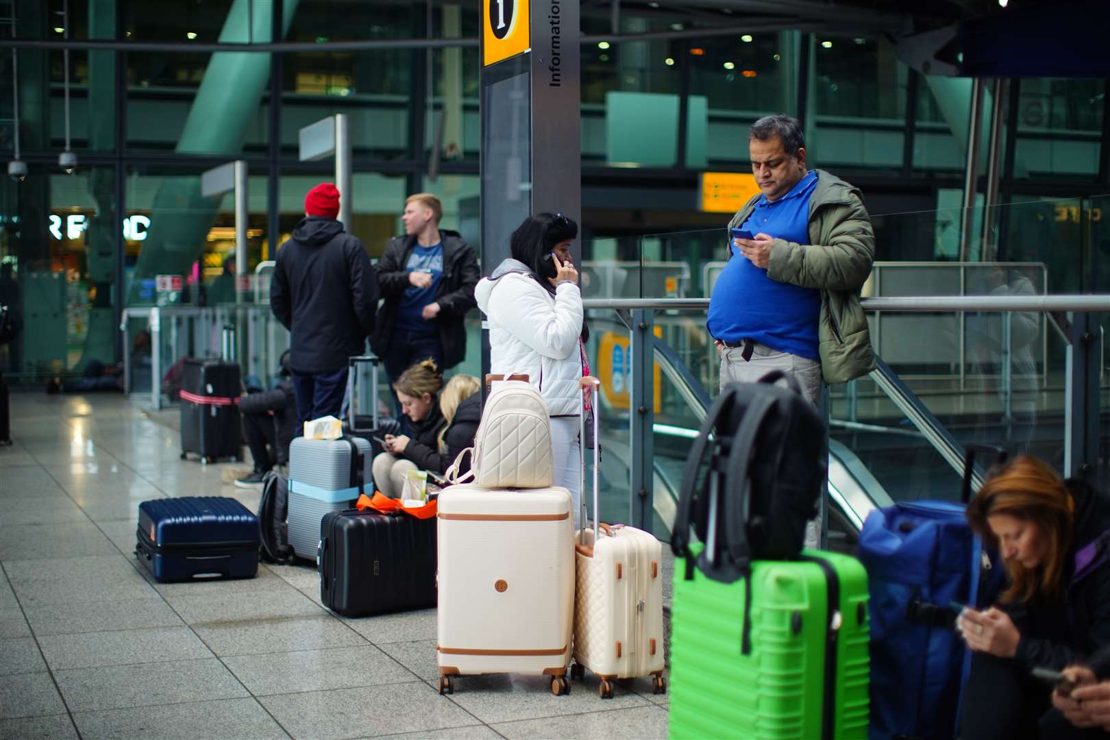 Stranded passengers at Heathrow Terminal 5 (James Manning/PA)