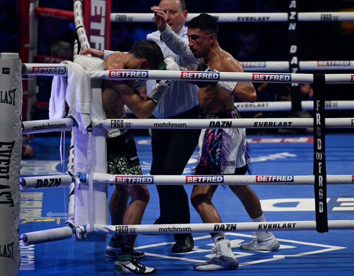 The final flurry of punches from Jordan Gill ends the contest. Picture: Matthew Pover (Matchroom Boxing)