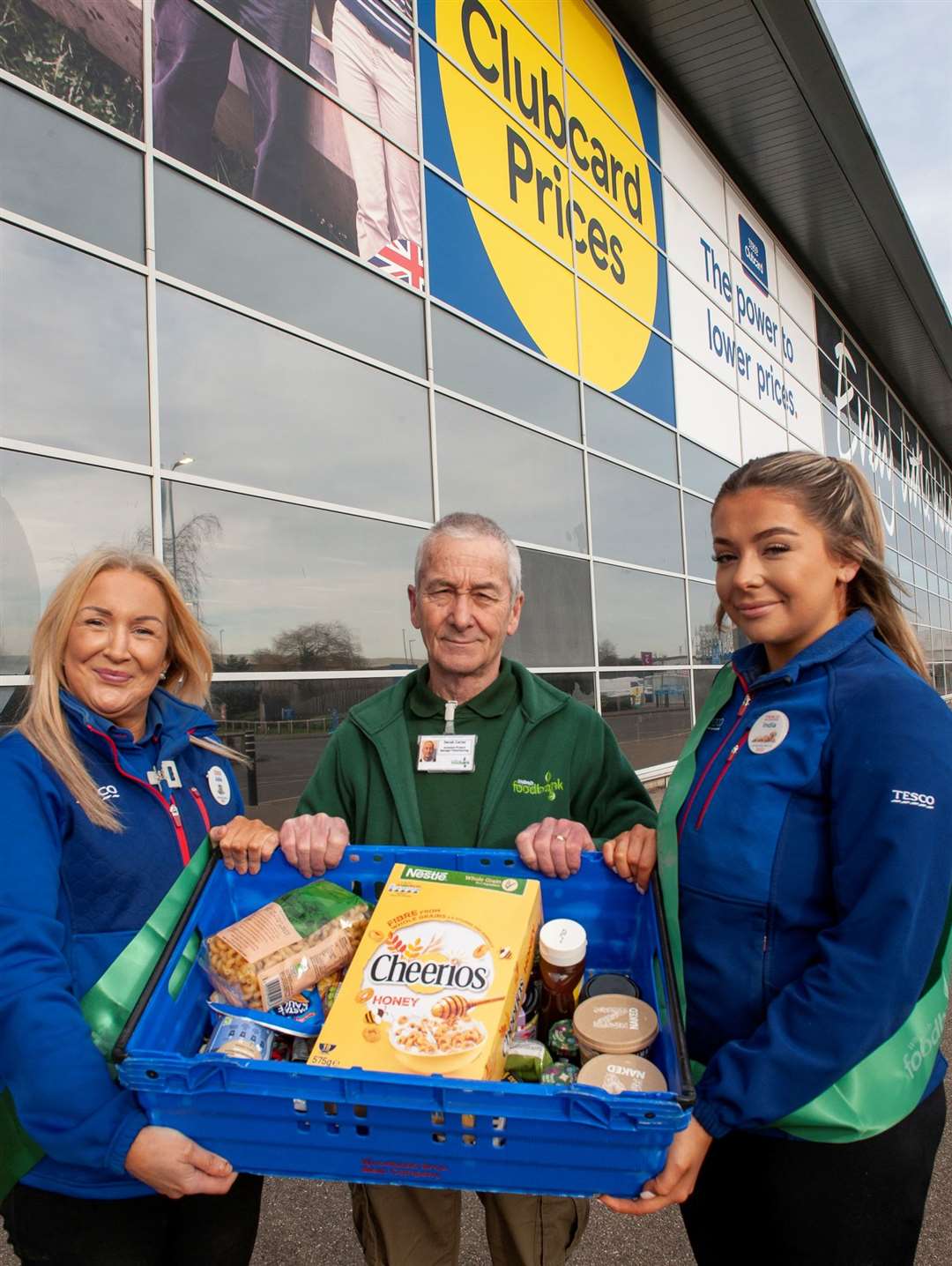 From left: Julie Bushby (Tesco), Derek Carter (Foodbank) and India Bliss (Tesco).