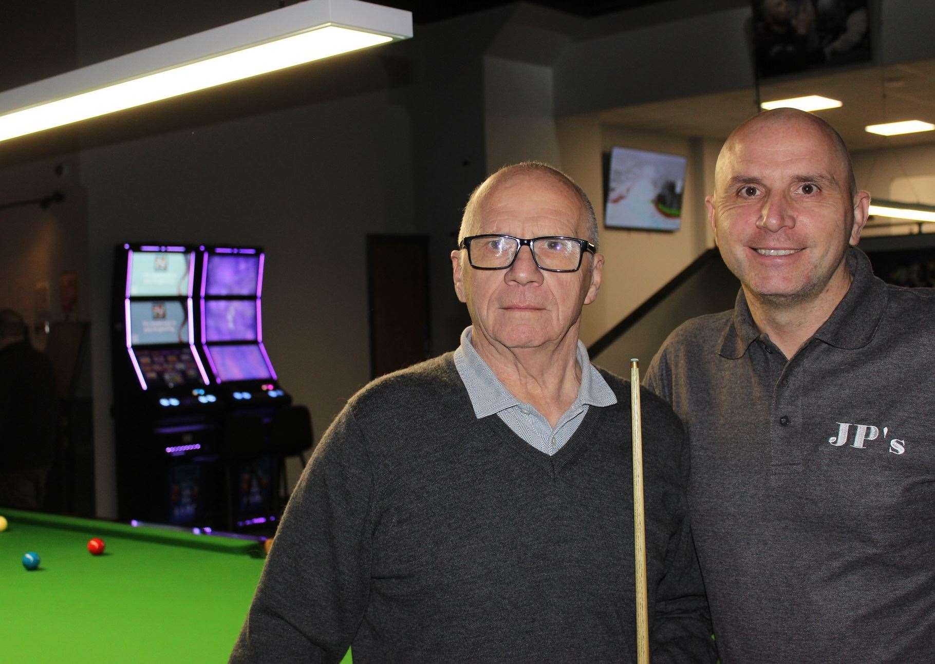 Joe Perry, right, with his dad, Chatteris resident Peter, on the opening day of Joe Perry’s Snooker and Pool Palace, in Chatteris