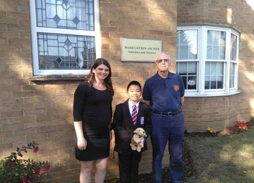 Liam Villarosa receives his prize from Lauren Dilworth and Rotarian David Young. (18474299)