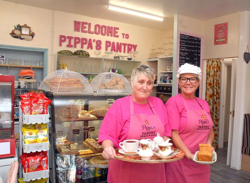 Owner Pippa Jones (left) and Joanne Burton ready to service tea and lemon drizzle cake at Pippa’s Pantry in Sutton Bridge. Photo by Tim Wilson. SG-211119-039aTW.