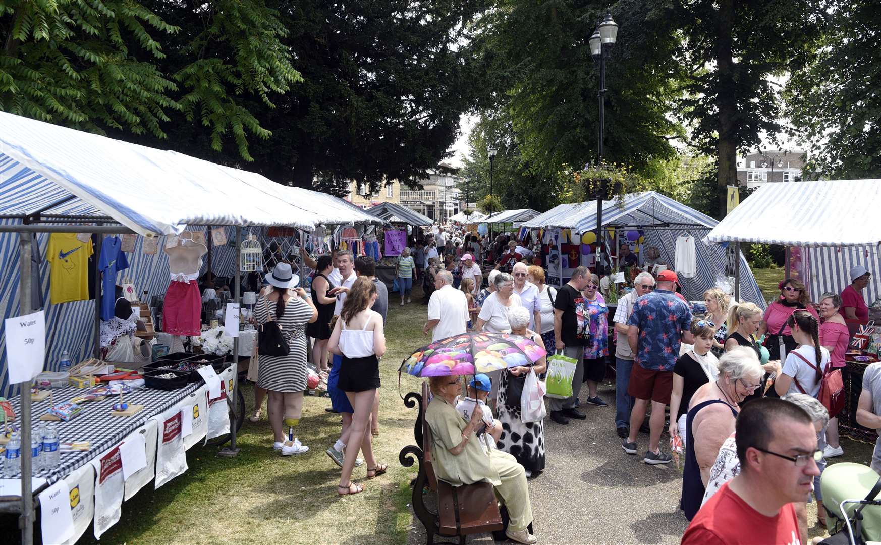 Wisbech Rose Fair includes dozens of charity stalls in St Peter's Church gardens.