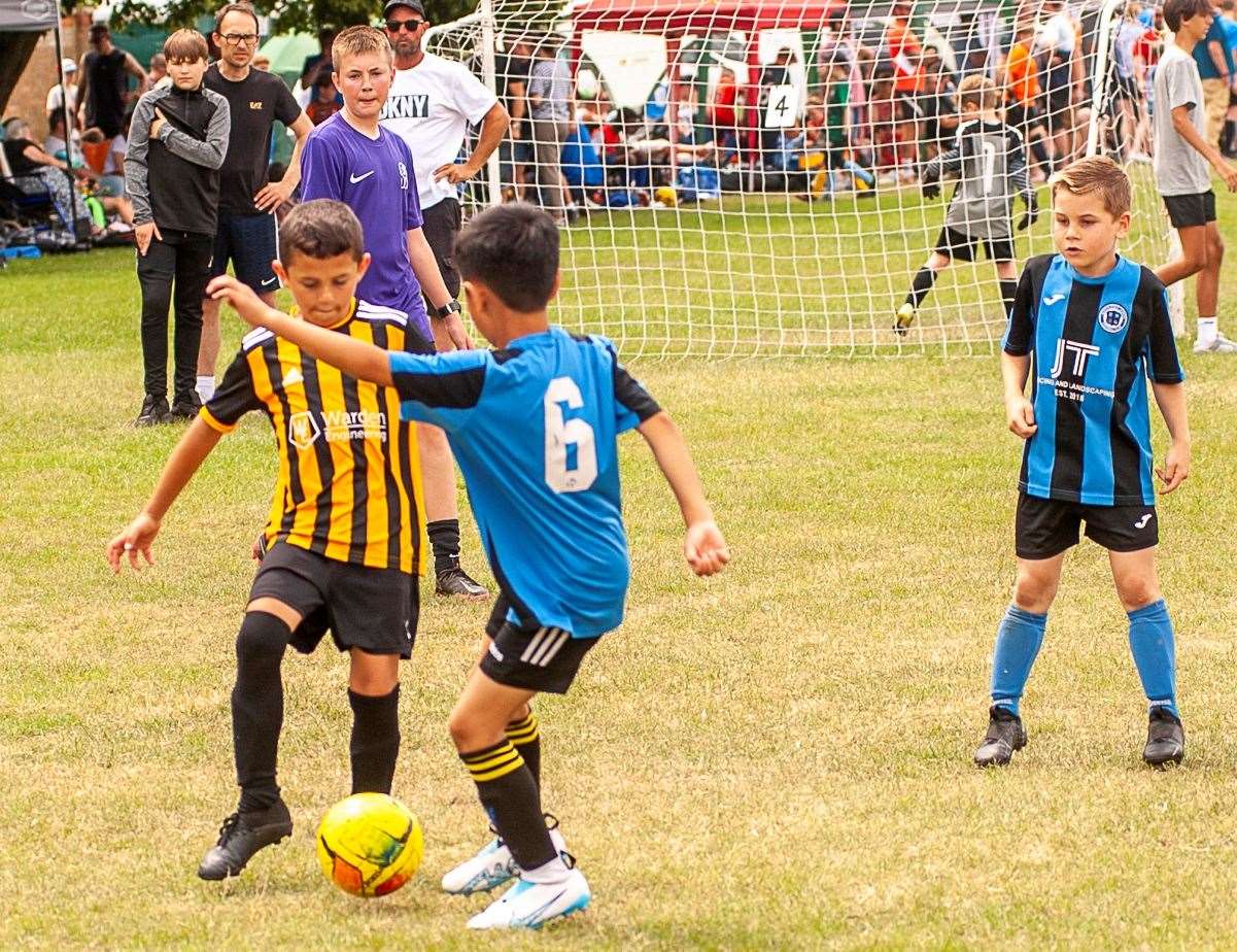 Action from the annual Wisbech St Mary football tournament.