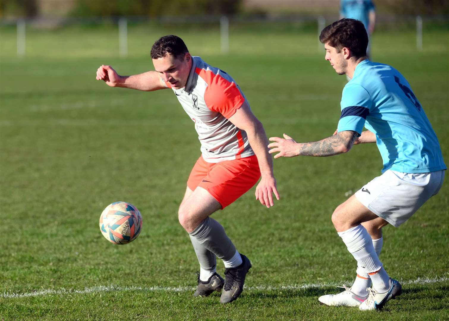 Parson Drove (grey and orange) v Holland (blue). Harrison Taylor